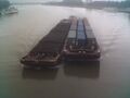 File:Barge carrying shipping containers.jpg